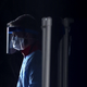 A health care worker prepares to screen people for the coronavirus at a testing site erected by the Maryland National Guard in a parking lot at the FedEx Field earlier this March in Landover, Maryland